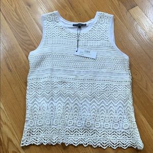 Sleeveless white top